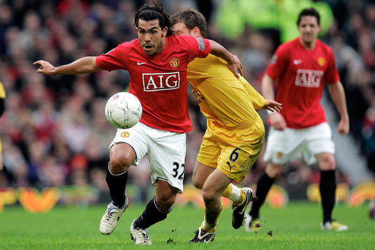 Carlos Tevez och Teemu Tainio