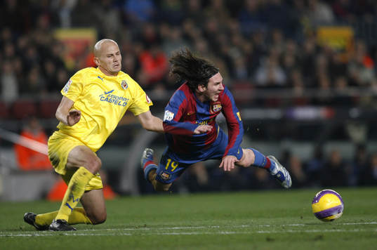 Pascal Cygan och Lionel Messi