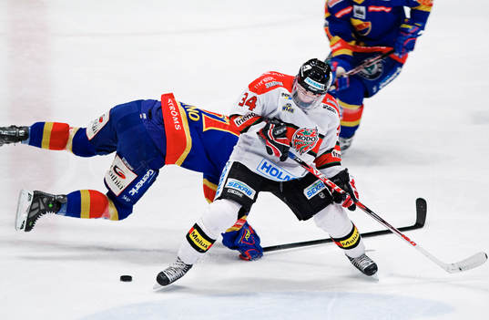 Tommy Wargh, Modo, tacklar Johan Ryno, Djurgården