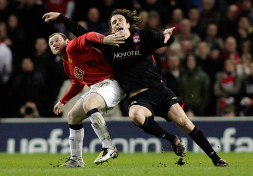 Wayne Rooney och Sebastien Squillaci