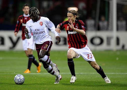 Bacary Sagna och Massimo Ambrosini