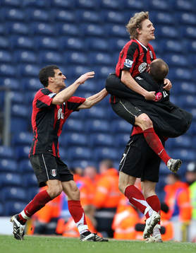 Jimmy Bullard, Danny Murphy och Paul Stalteri, jubel