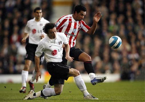 Simon Davies och Kieran Richardson