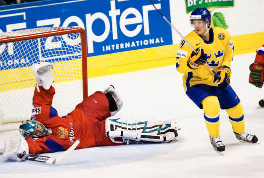 Fredrik  Warg och Evgeny Nabokov, målvakt