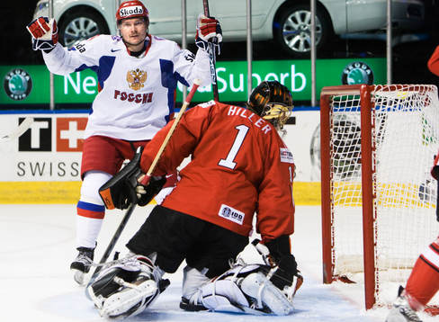Dmitri Kalinin, jubel och Jonas Hiller, målvakt