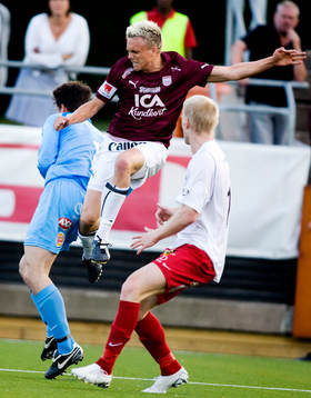 Peter Elmander, Qviding, kolliderar med Ola Svensson
