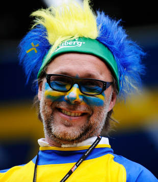 Fan, supporter, fjädrar, huvudbonad, glasögon,