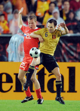 Aleksandr Anyukov och Andres Iniesta