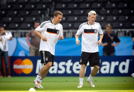 Lukas Podolski och Bastian Schweinsteiger