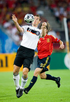 Miroslav Klose, Tyskland och Carles Puyol, Spanien