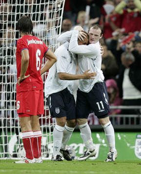 Wes Brown och Wayne Rooney, jubel