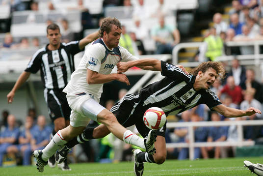 Johan Elmander och Fabricio Coloccini