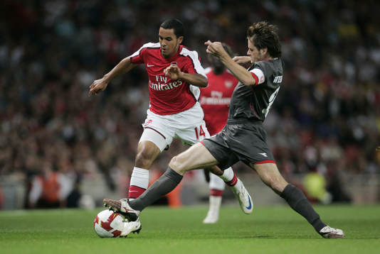 Theo Walcott och Edson Braafheid