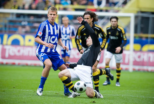 Pontus Wernbloom, Göteborg, och Miran Burgic, AIK, som