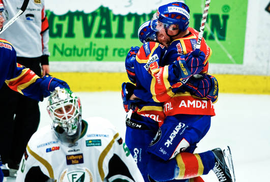 Jimmie Ölvestad, och segerskytten Mikael Ahlen, Djurgården