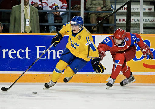 Marcus Johansson, Sverige, åker ifrån Nikita Klyukin,
