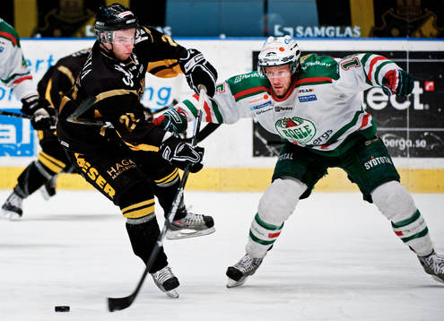 Sebastian Karlsson, Rögle, stoppar Christian Sandberg, AIK