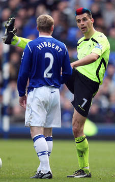 Paul Scharner, Wigan och Tony Hibbert, Everton