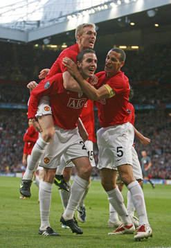 John O'Shea med Darren Fletcher och Rio Ferdinand,