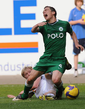 Andreas Beck, Hoffenheim tacklar Marcel Schaefer, Wolfsburg