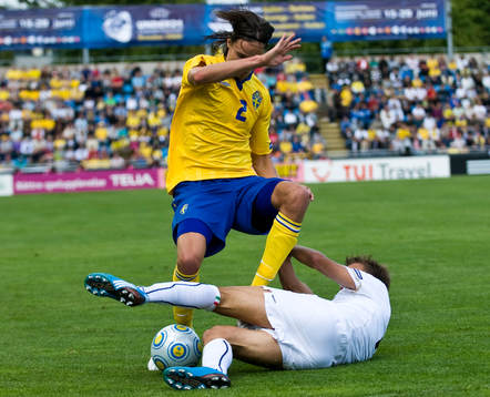 Mikael Lustig, Sverige, Domenico Criscito, Italien