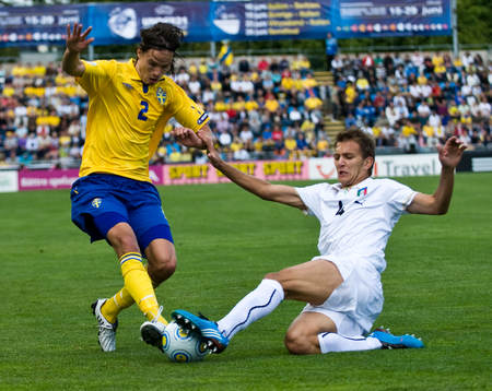 Mikael Lustig, Sverige, Domenico Criscito, Italien