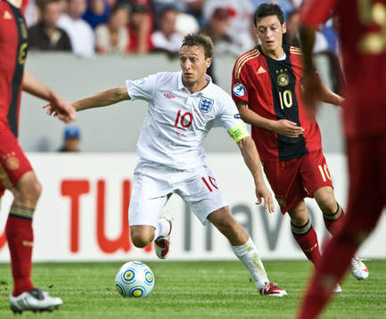 Mark Noble, England och Mesut Özil, Tyskland