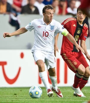 Mark Noble, England och Mesut Özil, Tyskland