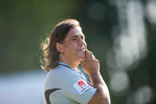 Özcan Melkemichel, tränare