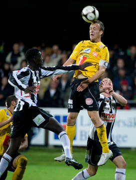 Marcus Ekenberg,  Mjällby och Alagie Sosseh och Johan