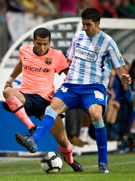 Dani Alves, Barcelona och Juanito, Malaga