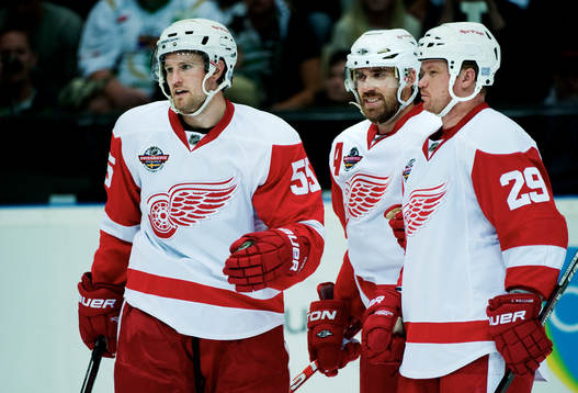 Niklas Kronwall, Henrik Zetterberg och Jason Williams,