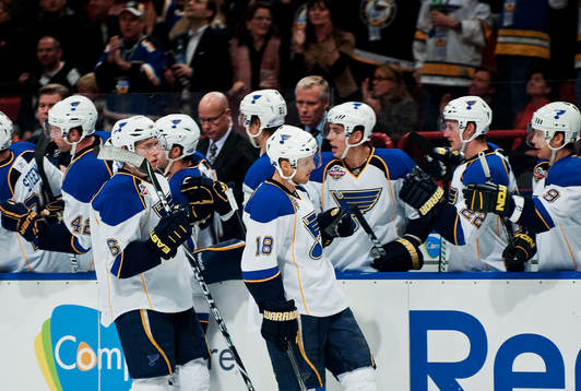 Jay McClement, St Louis, gratuleras till sitt mål