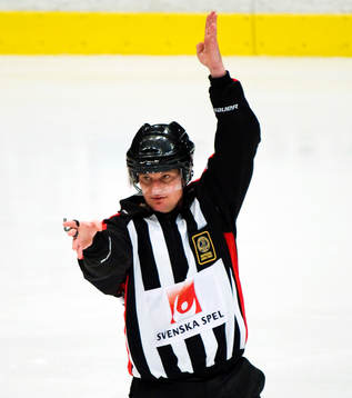 Markus Winnerborg, domare. Tecken