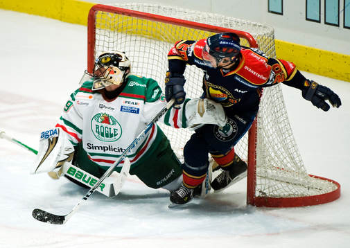 Jürgen Penker, målvakt, Rögle och Christian Eklund,