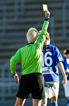 Domare, gult kort, varning, genre