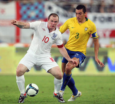 Wayne Rooney, England och Lucio, Brasilien