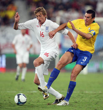 Peter Crouch, England och Lucio, Brasilien