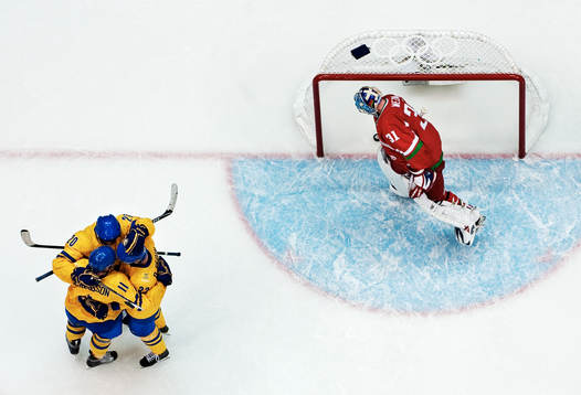 Henrik Sedin, Daniel Alfredsson och Daniel Sedin, Sverige,