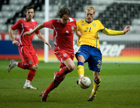 Chris Gunter, Wales och Christian Wilhelmsson, Sverige