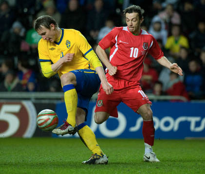Kim Källström, Sverige och Simon Davies, Wales