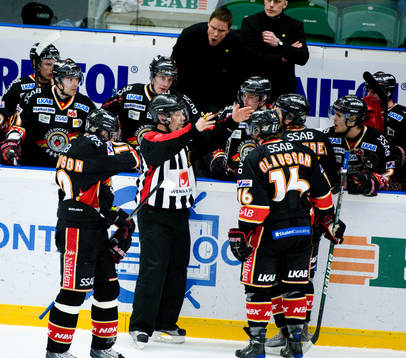Thomas Andersson, domare, och Roger Rönnberg, tränare,
