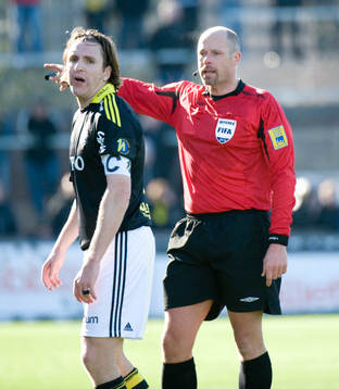 Domare Martin Hansson och Nils-Eric Johansson, AIK