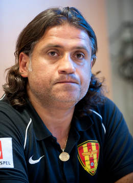 Özcan Melkemichel, Tränare
