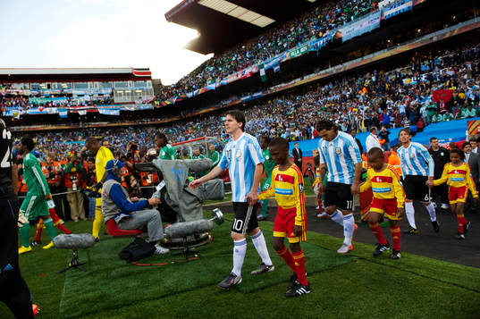 Lionel Messi, Carlos Tevez och GabrielHeinze  Argentina