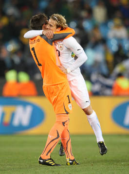 Fernando Muslera, målvakt, Uruguay jubel med Diego Forlan