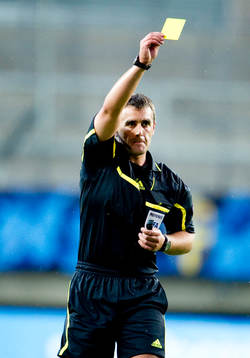 domare Euan Norris från Skottland