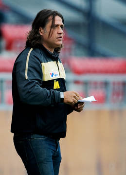 Özcan Melkemichel, tränare, Syrianska