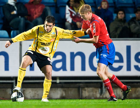 Mostapha El Kabir, Mjällby och Markus Holgersson,
