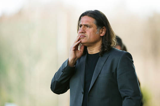 Özcan Melkemichel, tränare